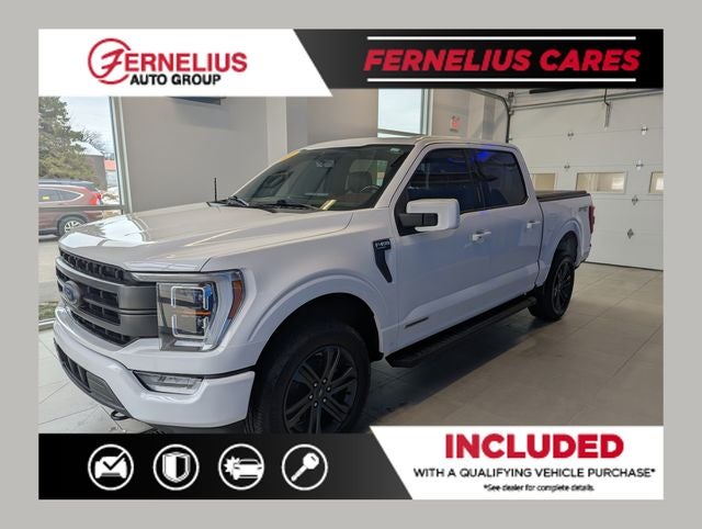 2021 Ford F-150 Lariat in Oxford White — front three-quarter view